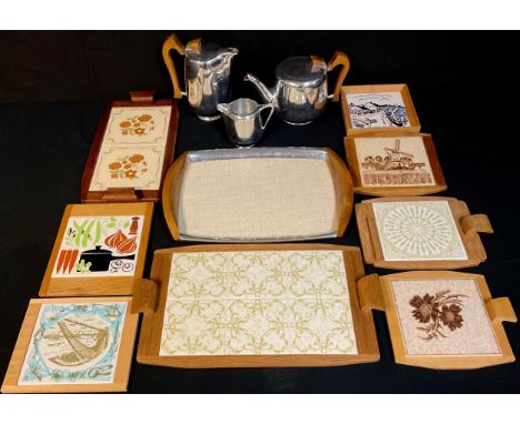 A mid-20th century Piquot ware tea service on tray; similar retro cheese boards, set with tiles; qty 