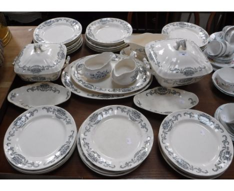 A LUTECE CERAMIC PART DINNER SERVICE, decorated with transfer printed flowers