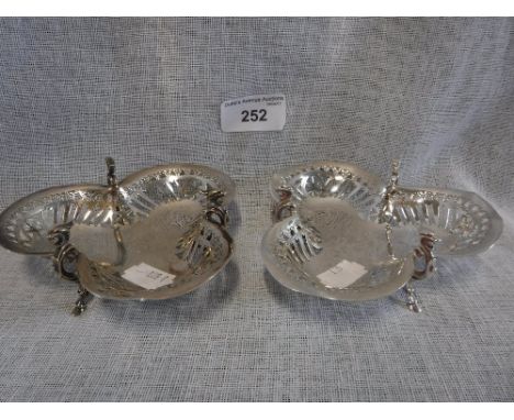 A PAIR OF EDINBURGH SILVER PIERCED TREFOIL BON BON DISHES with three  griffin and hoof feet, maker Hamilton & Inches, 1900