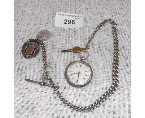 A SILVER CASED FLORAL ENGRAVED LADIES FOB WATCH with silver Albert, fob and T-bar