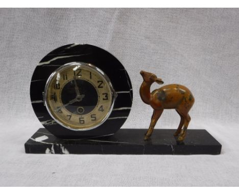 AN ART DECO STYLE MANTEL CLOCK, in a black marble case, with a painted fawn 