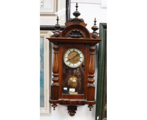 A LATE VICTORIAN WALL CLOCK with an architectural style case, 82" high