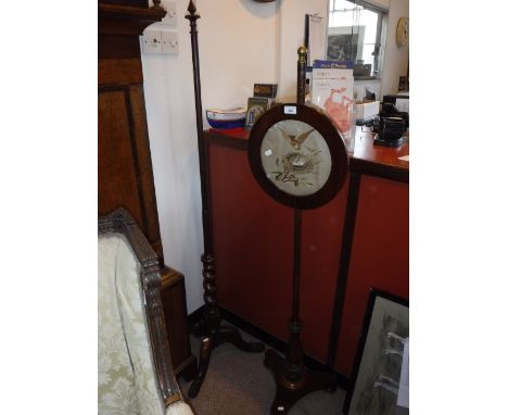 A 19TH CENTURY POLE SCREEN (with later panel) and a similar stand (only) 