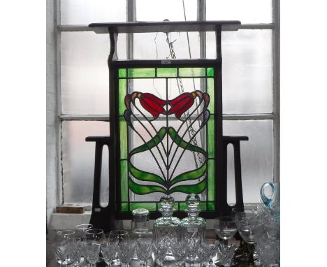 AN ARTS & CRAFTS 'QUAINT' OAK FIRE SCREEN or window plant stand with inset stained glass panel 