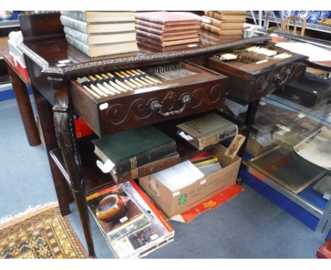 A LATE 19TH/EARLY 20TH CENTURY CHIPPENDALE REVIVAL SERVING TABLE/CANTEEN, containing cutlery in two fitted drawers with a she