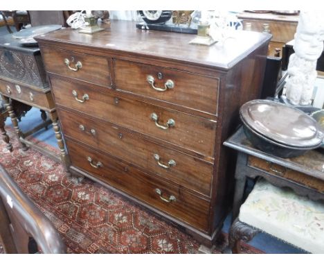 A GEORGE III MAHOGANY CHEST OF DRAWERS on bracket feet with brass swan neck handles, 43" wide