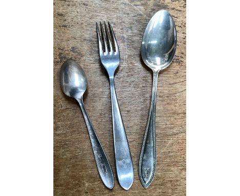 Three WW2 German items of cutlery small spoon stamped SS-Reich, the table fork stamped with German Army eagle, the table spoo