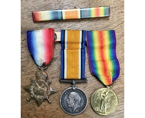 WW1 medals for 15666 PTE T. R. Wilding of the South Staffordshire Regiment with ribbon board.
