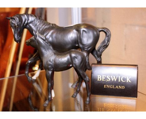 BESWICK HORSE & FOAL. Beswick black horse figure, Foal and a Beswick ceramic sign, tallest H: 18 cm