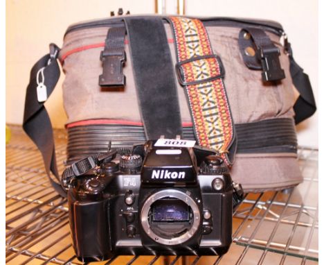NIKON CAMERA BODY. Nikon camera F4 body with strap and case