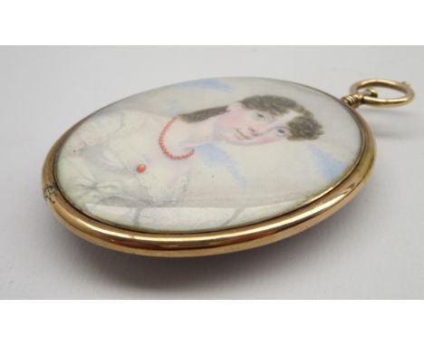 Miniature oval portrait of a young Regency lady in a white dress with a coral brooch and necklace with a lock of hair to the 