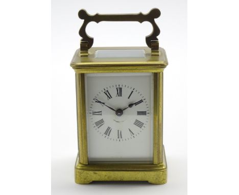Miniature early 20th century carriage clock time-piece, brass and glazed case with Roman dial, movement stamped 'Made in Fran