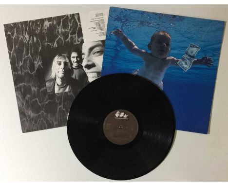 NIRVANA - NEVERMIND LP (UPSIDE DOWN MONKEY INNER - GEF 24425). A beautiful copy of Nevermind, the big selling 1991 studio alb