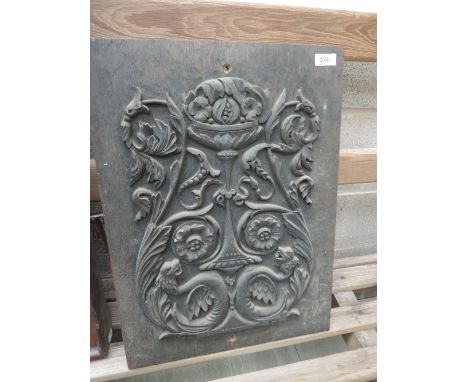 A carved wooden panel