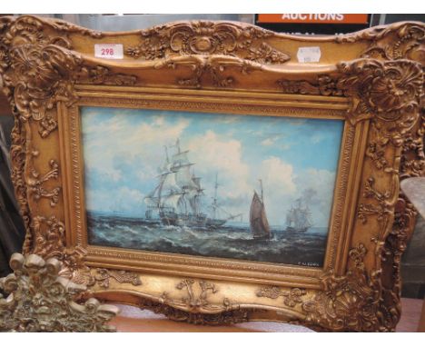 A gilt framed print after E W Cooke sailing ships