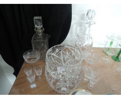 A selection of cut glass including claret jug, decanter , liqueur glasses and fruit bowl etc