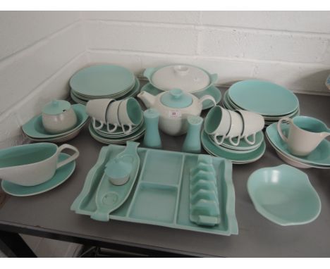 A large selection of Poole table ware including dinner service pale green on a grey ground