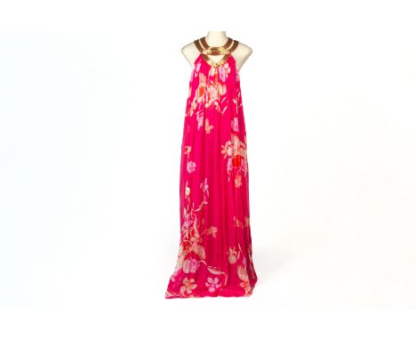 A MATTHEW WILLIAMSON ESCAPE SILK MAXI DRESS
With beaded criss-cross collar, the dress decorated with floral and feathered pat