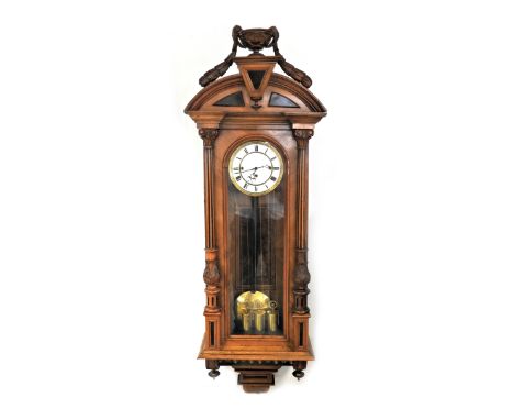 A Vienna regulator style walnut cased three weight wall clock, 19th century, seven inch, white enamel two piece dial with Rom