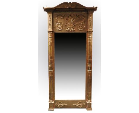 A Swedish carved giltwood pier glass with matching console table, Charles XIV, circa 1820 with scroll pediment above anthemio