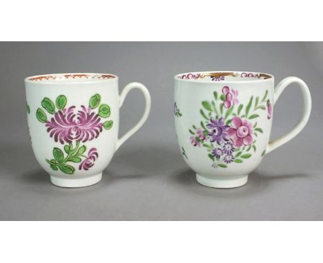 Two Caughley polychrome porcelain coffee cups painted with red and puce flowers among green leaves, circa 1785-90, unmarked, 