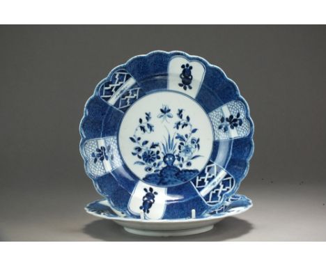 A Caughley powder blue fluted plate in the Holed or Flaming Rock design, circa 1778-80, C mark, 18cm diameter, together with 