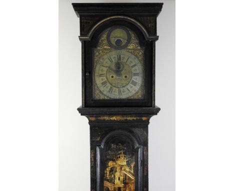 An early 18th century chinoiserie lacquered longcase clock, the square hood enclosing a twelve inch arched brass dial with Ro