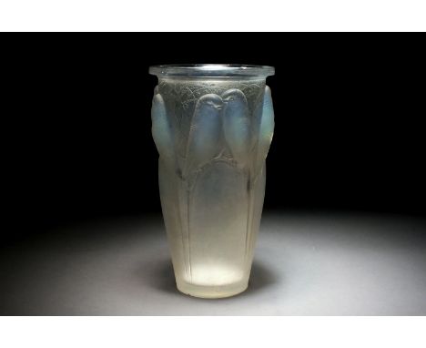 A Rene Lalique 'Budgerigar' or 'Ceylan' opalescent glass vase, stencilled R. Lalique, 24cm high (chipped)     There are three