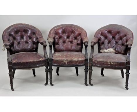 A set of six simulated rosewood and oak framed leather open armchairs, 19th century, each with a shaped button back, padded e