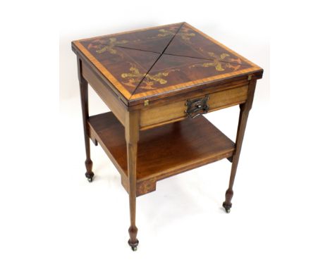 An Edwardian mahogany satinwood cross banded and coloured pen work envelope top card table, the square top detailed with Art 