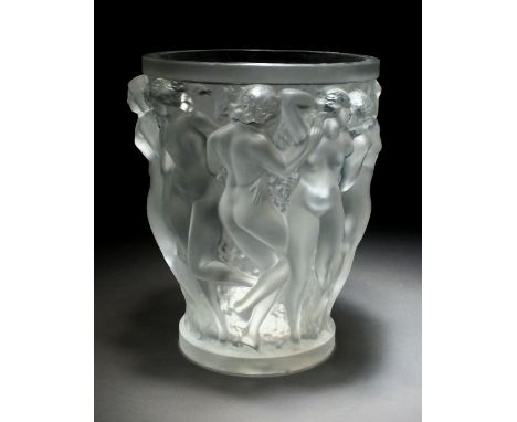 A contemporary Lalique Crystal 'Bacchantes' pattern glass vase, 24.5cm high  Some light staining and scratching to the base, 