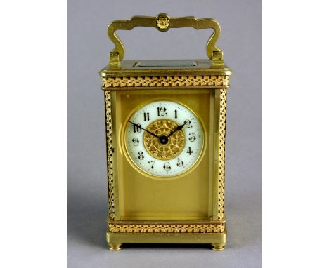 A brass case carriage timepiece with five panel glass cased and platform lever escapement, 5cm annular dial with Arabic numer