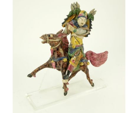 Antique Chinese Glazed Pottery Roof Tile Figurine Affixed on Lucite Stand. Depicts a warrior on horseback. Has a few cracks a