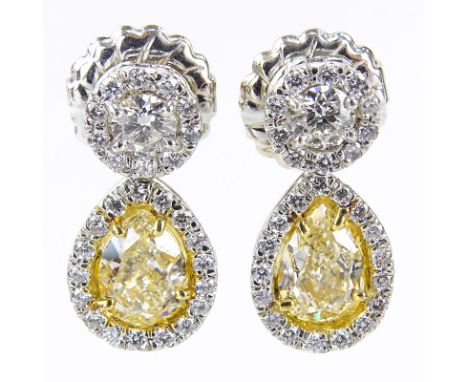 EGL Certified 2.03 Carat Pear Shape Fancy Light Yellow Diamond and Platinum Pendant Earrings Accented throughout with .74 Car