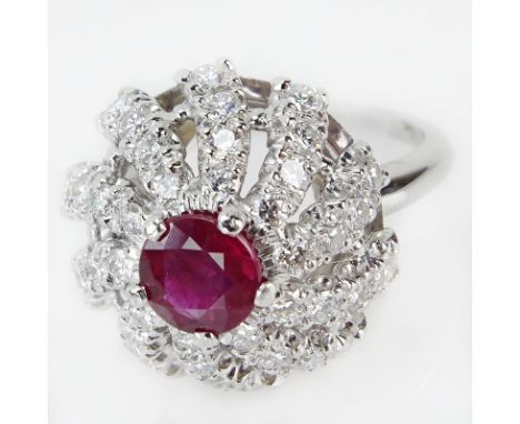 Circa 1940 Approx. 2.25 Carat Round Brilliant Cut Diamond, 1.40 Carat Round Cut Ruby and Platinum Ring. Diamonds H color, VS1