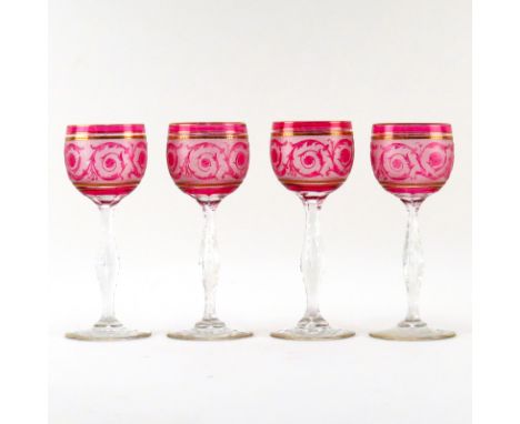 Set of Four (4) Baccarat Etched Ruby to Clear Glass Wine Stems. Unsigned. Minor wear to gold decoration or in good condition.