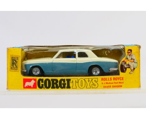 Corgi - A boxed Rolls Royce Silver Shadow Coupe with take off wheels # 273. The car appears Near Mint with some minor rub mar