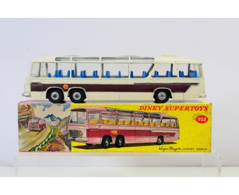 Dinky - A boxed Duple Vega Luxury Coach # 952. The model appears Near Mint in a Good box with some storage marks. (This does 