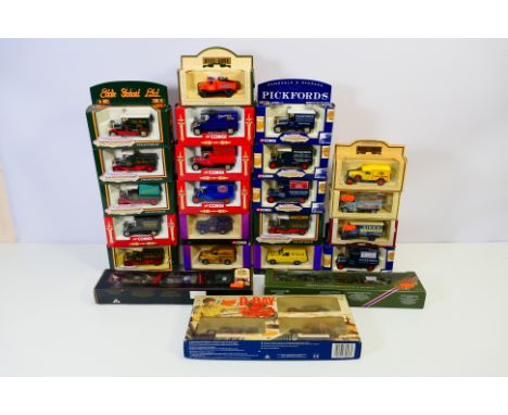 Corgi - Days Gone - Lledo - A mixed boxed group of 23 boxed model cars. Lot includes #43007 Morris Light Truck (Birds Custard