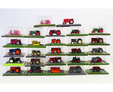 Hachette - A group of 27 boxed diecast vehicles by Hachette in 1:43 scale (approx 6 cm long) Predominately tractors, to inclu