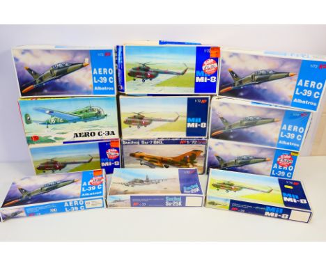 KP - 12 boxed vintage 1:72 scale plastic military aircraft model kits. Lot includes KP #28 Mil Mi-8; KP #15 Aero L-39C; KP Ae