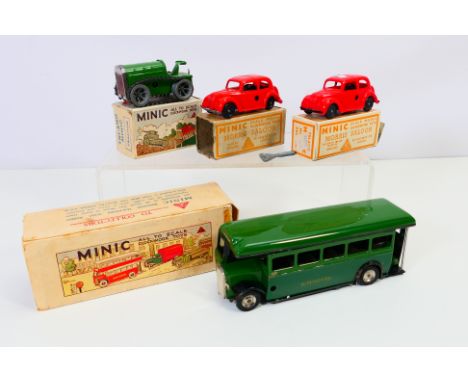 Tri-ang - Minic - 4 x boxed clockwork vehicles, a single deck Greenline Bus, a tracked tractor, and 2 x Morris 8 saloons. The