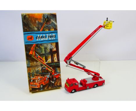 Corgi - A boxed Bedford TK Simon Snorkel Fire Engine # 1127. The model appears in Good condition with light wear and the box 