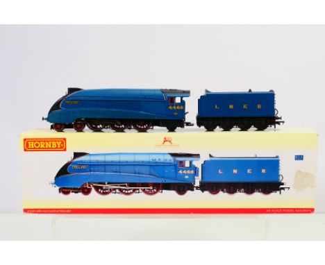 Hornby -  A boxed OO gauge Class A4 named Mallard number 4468 # R2339. The box is marked DCC Ready. The model shows signs of 