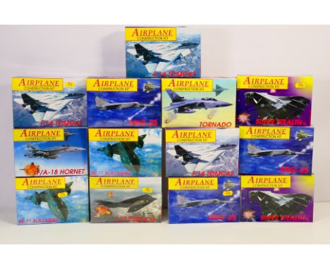 PMS - 12 boxed 1:144 scale plastic model kits from PMS. Lot includes F:14 Tomcat; Tornado; Super Stealth Fighter and similar.