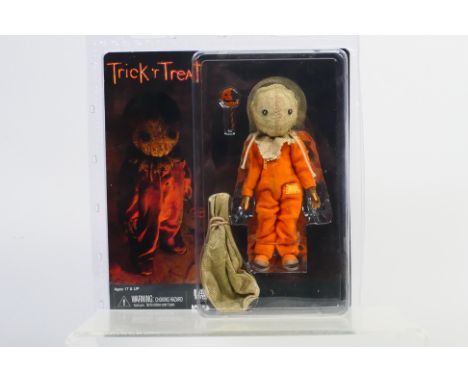Trick 'r Treat - Neca - An unopened Trick 'r Treat Sam figure # 367N031319. The figure appears Mint in Very Good packaging. (