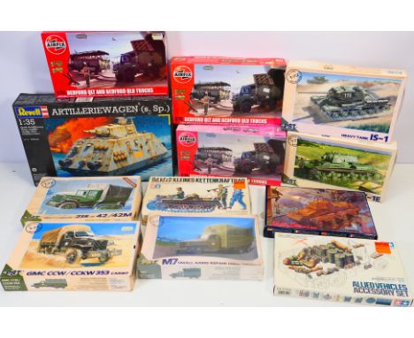 Airfix - Tamiya - Revell - PST - A group of plastic military vehicle, and accessory model kits in various scales. Lot include