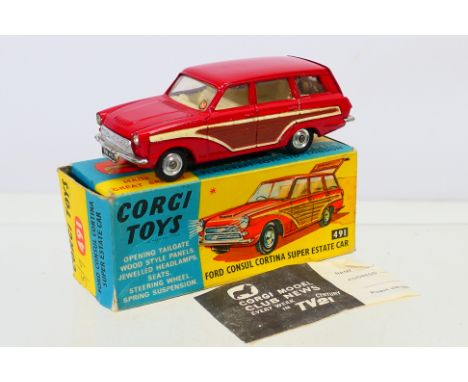 Corgi - A boxed Ford Cortina Estate # 491. The car appears Near Mint with some Very small marks, the box is Fair to Good with