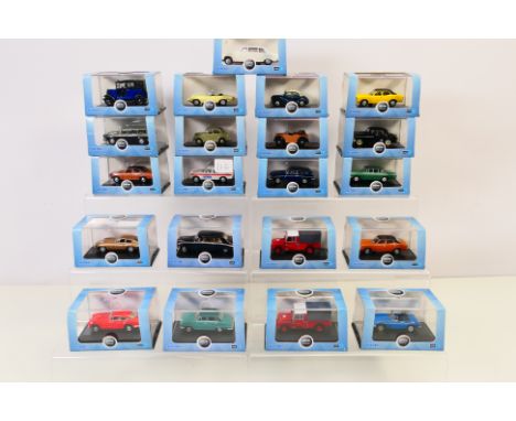 Oxford Diecast - 21 boxed Oxford Diecast model vehicles in 1:76 scale. Lot includes Oxford Diecast #76ETYP009 Bronze E-Type J