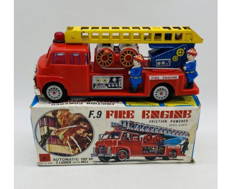 A vintage boxed Kokyu friction powered F.9 fire engine with siren - (No. K1842)